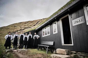 KOKS sits in the shadow of the mountains at Leynavatn in the Faroe Islands