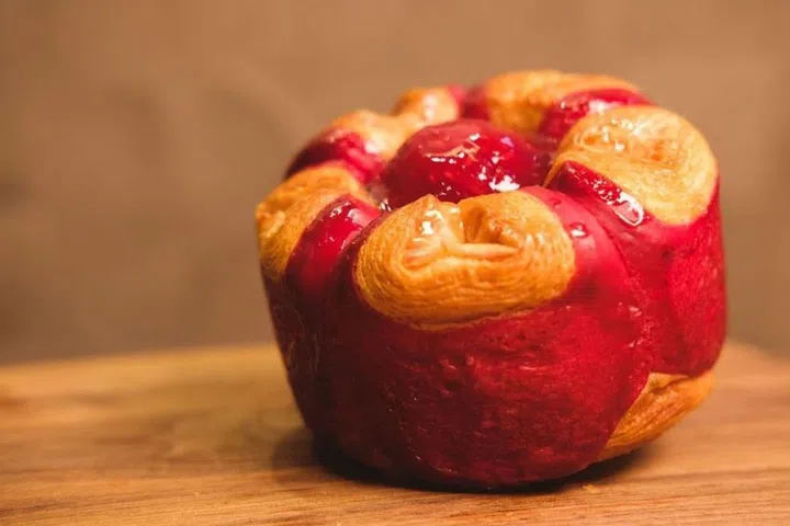 Croissant piped with jam made from French raspberries. Photo: Lunar Rabbit/Instagram
