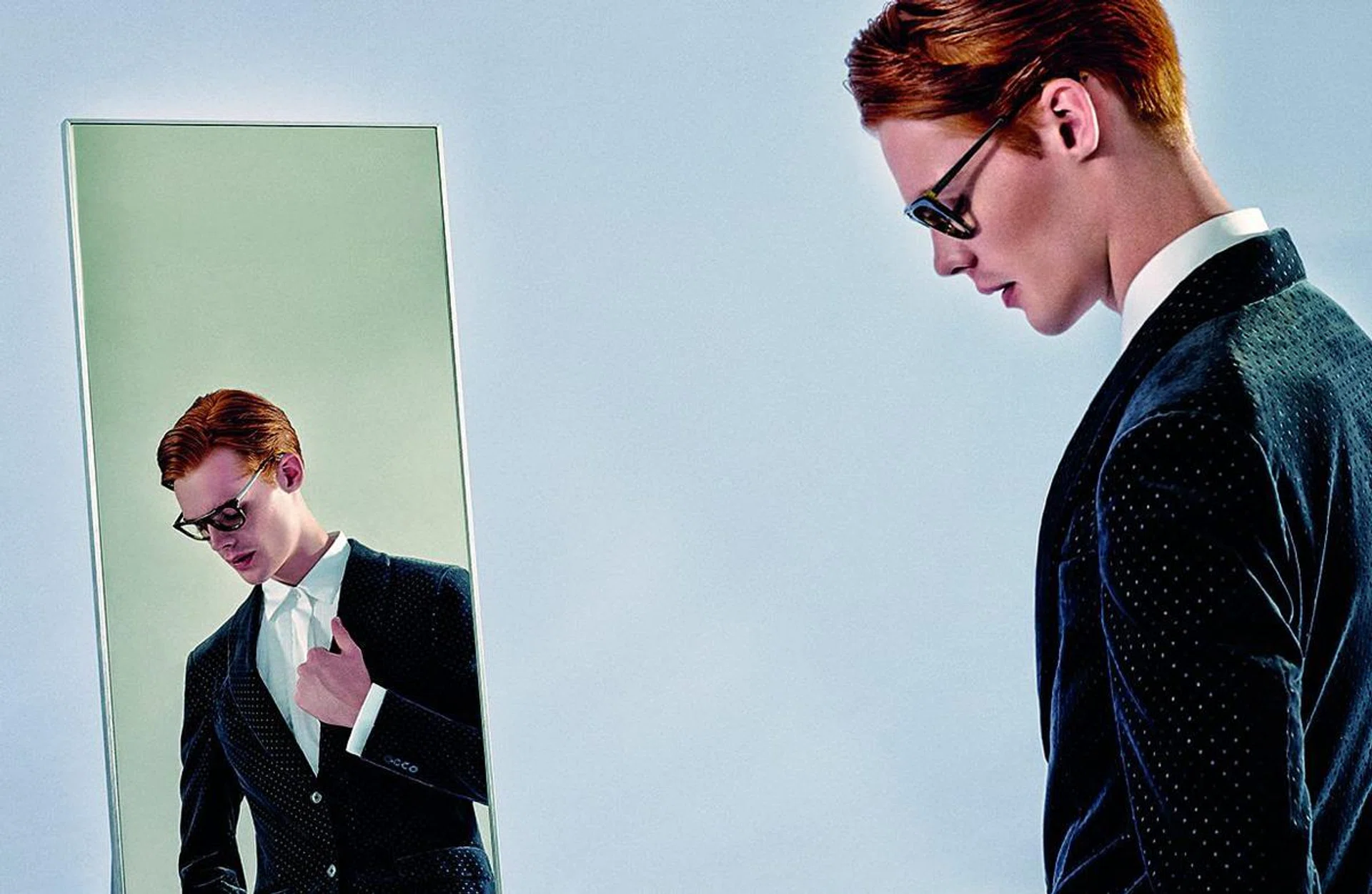 Dots add plenty of flair to a debonair essemble.

Black velvet suit and white cotton shirt, from Ermenegildo Zegna. Tortoiseshell glasses, from Prada.