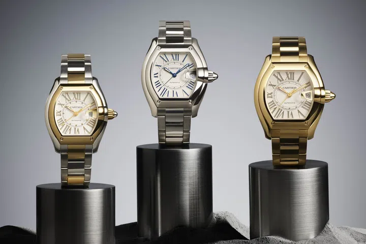 Three Cartier Roadster watches in medium and large sizes, as well as materials including stainless steel, yellow gold and two-tone versions.