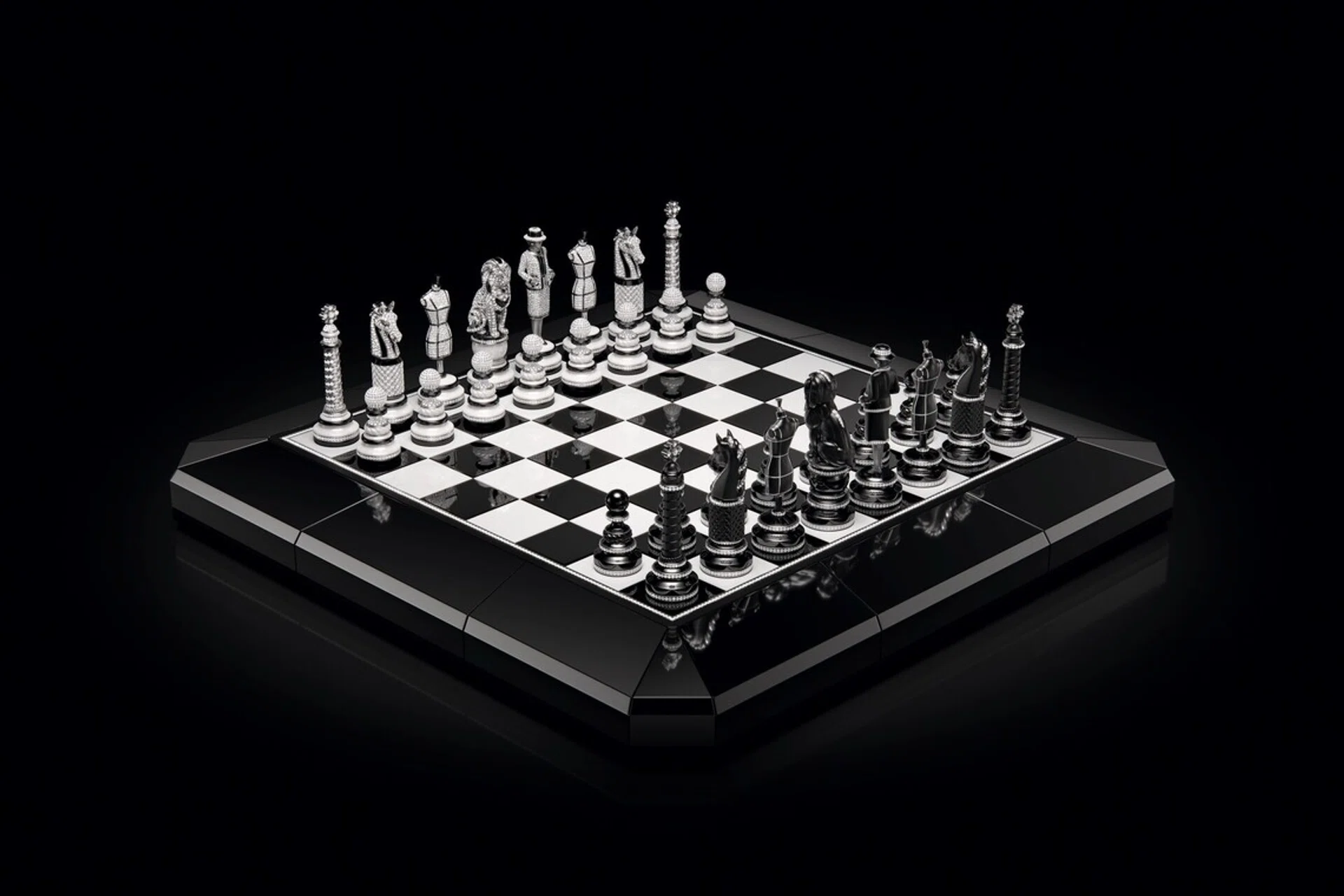 The Chanel Coco Game chessboard featuring black and white ceramic squares, diamond-set chess pieces inspired by Chanel motifs, and an obsidian base.