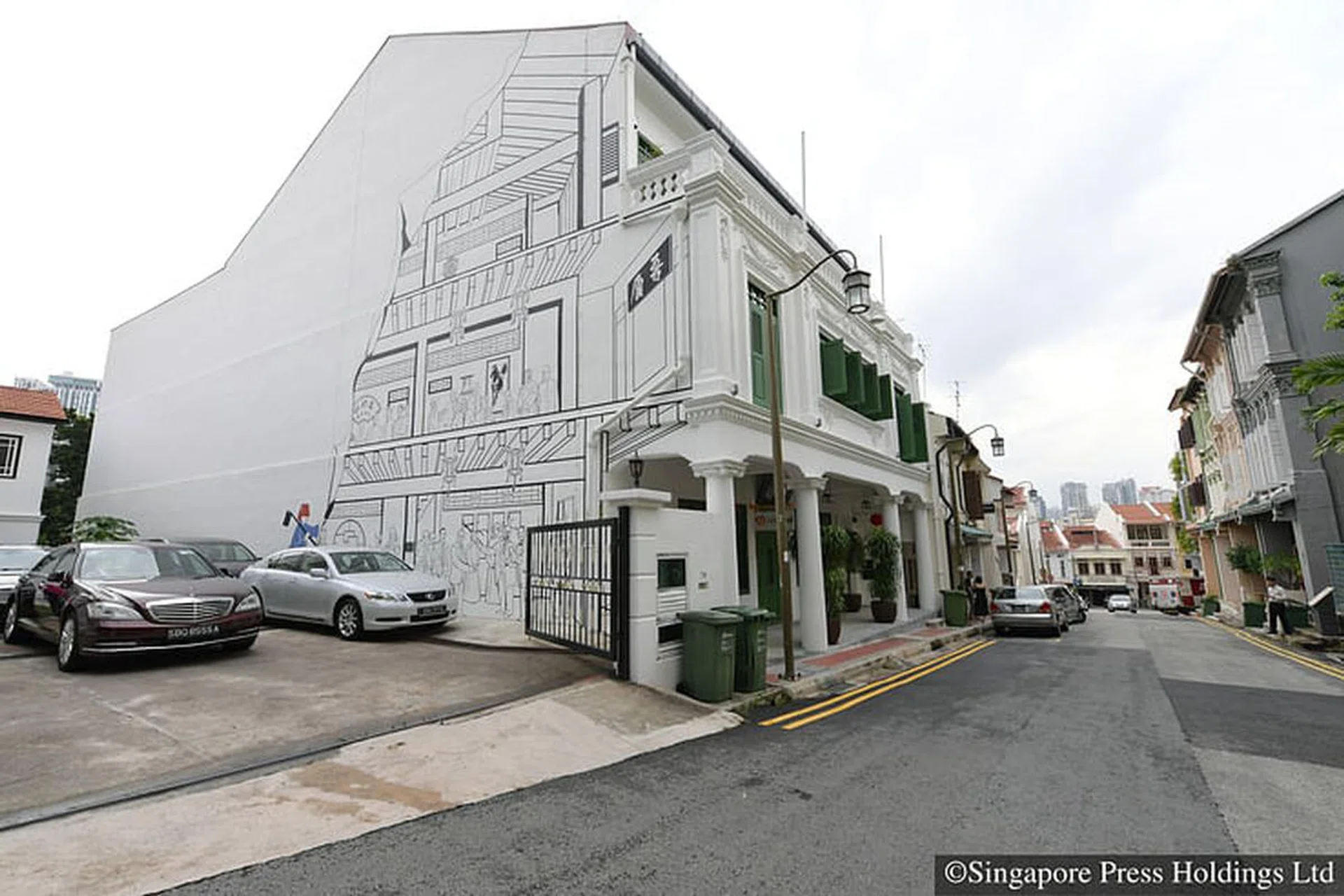 The mural painting on the facade of the 112-year-old Goh Loo Club at 72 Club Street. The mural was added during the renovation and features the faces of the Goh Loo Club's late members and Chinese revolutionary figure Sun Yat Sen. It was painted by Singaporean artists Benny Ong, Zhao Jian Wen and Didier Ng, and is meant to depict what the club was like when dignitaries visited. The club premises  a 998 sq m, three-storey shophouse at 72 Club Street that was gazetted for conservation in July 1989  underwent a 16-month renovation. It was completed in April 2016 at a cost of $3.8 million.