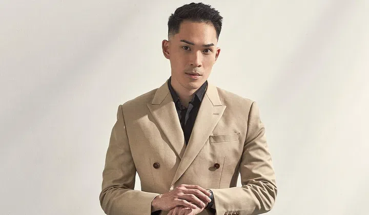 Financial adviser Lim Kim Sun is always in a suit when he is at the office.