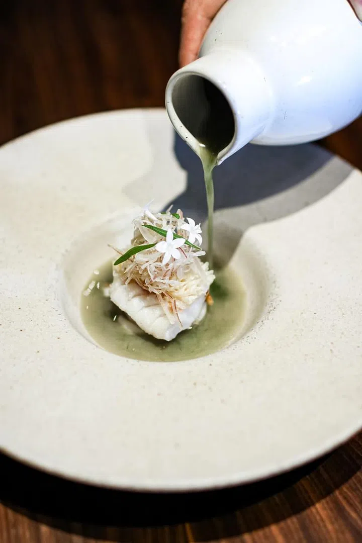 A new dish Fish Milk Soup of amadai and fish paste noodles at one-Michelin-starred Labyrinth. (Photo: Labyrinth)