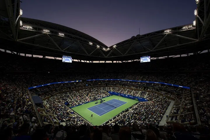 The atmosphere inside Arthur Ashe Stadium during a night session at the 2023 US Open (Photo: Rolex/Jon Buckle)