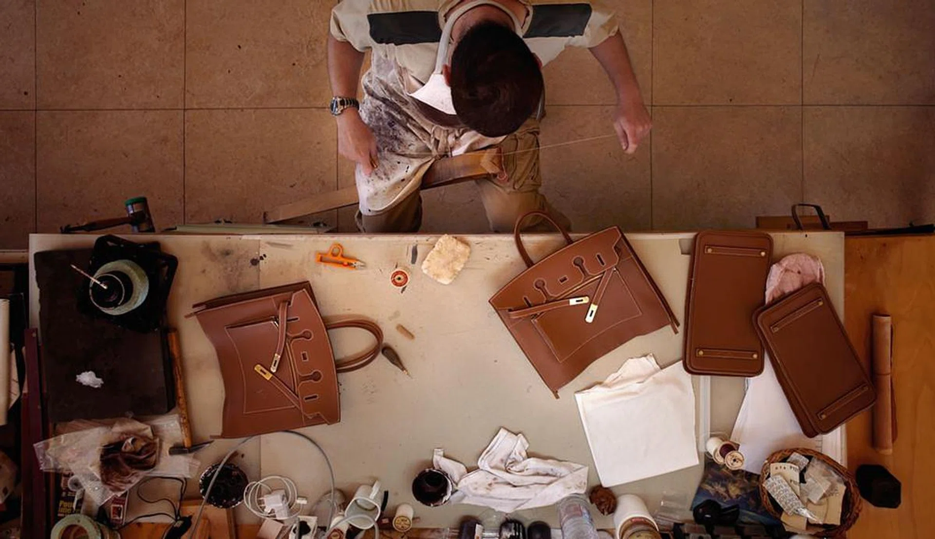 It takes about two years to train an Hermes craftsman, with each one supervised by an existing craftsman. 