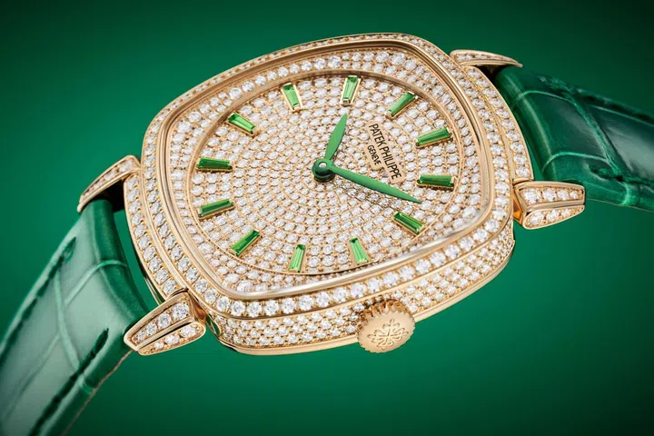 Patek Philippe Gondolo Ladies First Joaillerie Ref. 7043/250R-001 in rose gold, with a diamond-set dial and case, green tsavorite hour markers and green alligator strap.