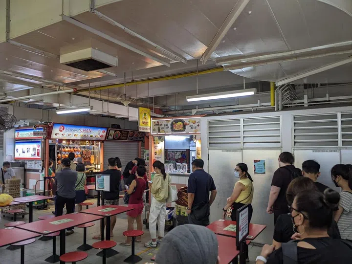 A long queue was formed at Hawker Chan barely 30 minutes after the stall opened. (Photo: Kenneth SZ Goh)