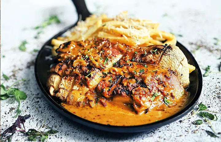 Grilled mushroom features in Bedrock Origin's Steak Diane.