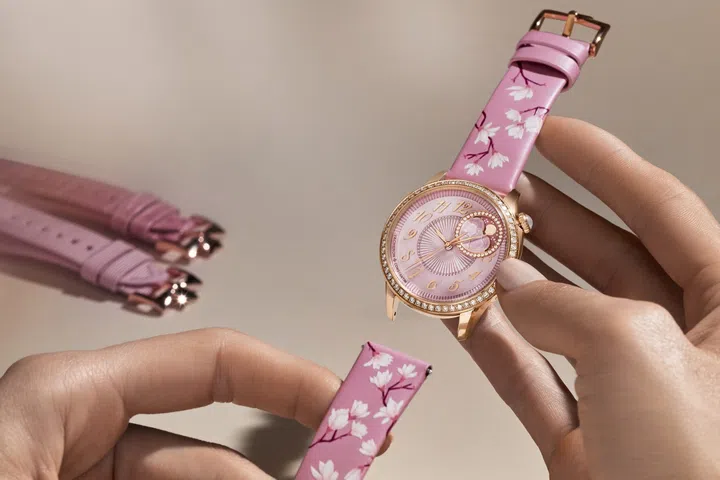 The Vacheron Constantin Égérie Moon Phase Spring Blossom with a pink calfskin strap featuring miniature-painted blossoms