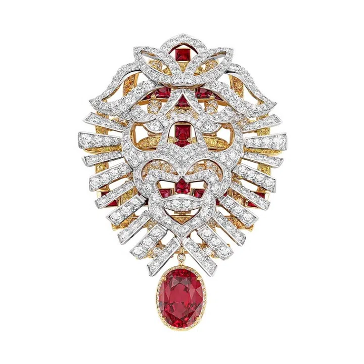 Chanel Tweed Lion white and yellow gold brooch with diamonds, rubies, spinel, and spessartite garnets. (Photo: Chanel)
