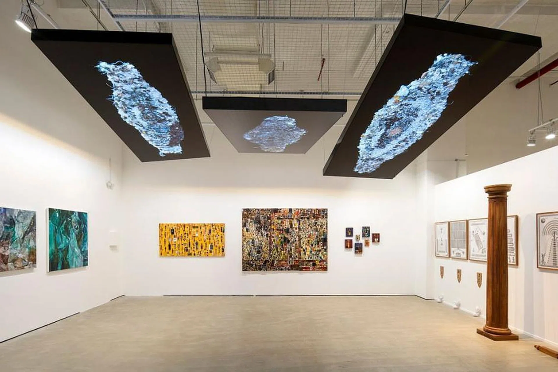 A glimpse into the exhibition space at S.E.A. Focus 2024, featuring works from the region’s artistic talents.