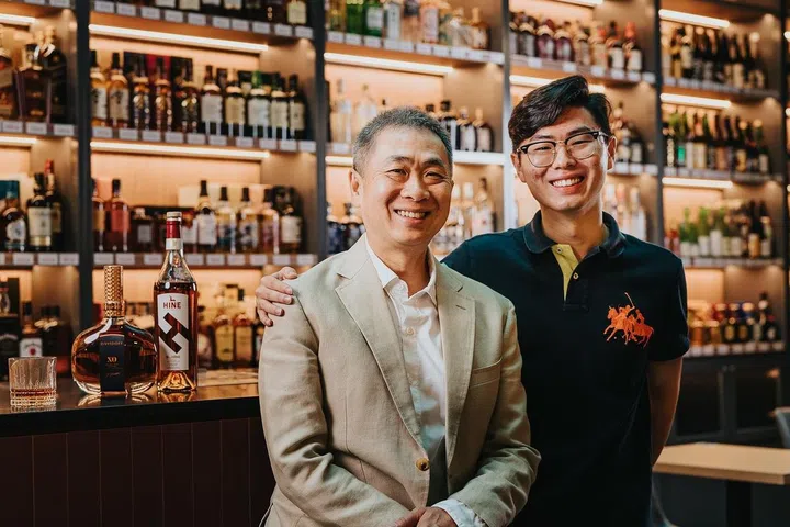 Bottles & Bottles founder Koh Chin Liang and son Min Kai. (photo: Bottles & Bottles)