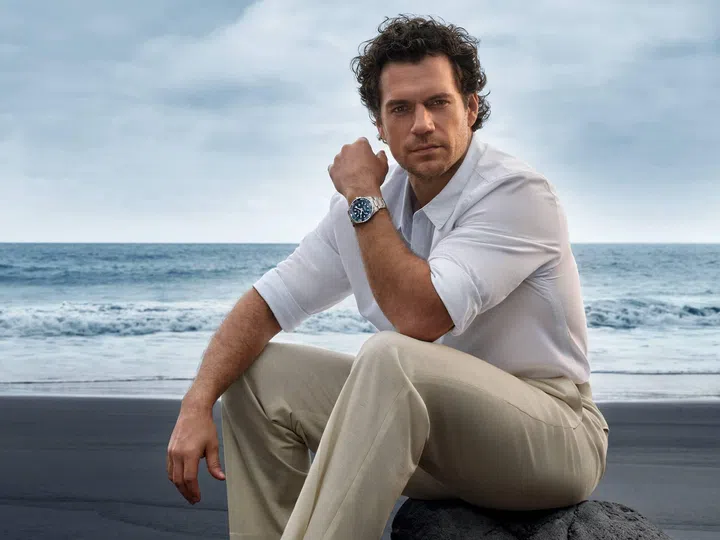 Henry Cavill wearing a Longines HydroConquest watch
