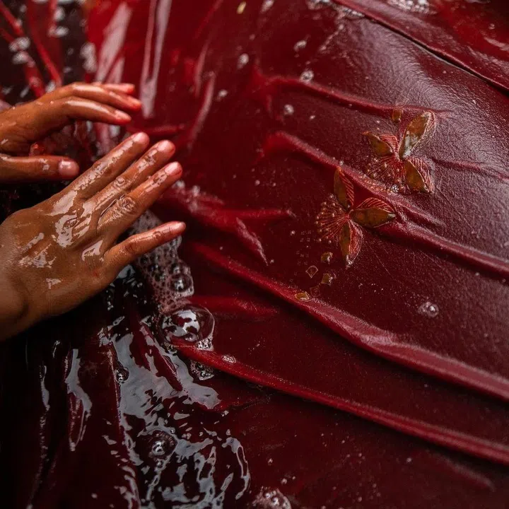To get this rare red, the Ibus dry-and-dye it by hand at least 20 times. (Photo: SukkhaCitta)