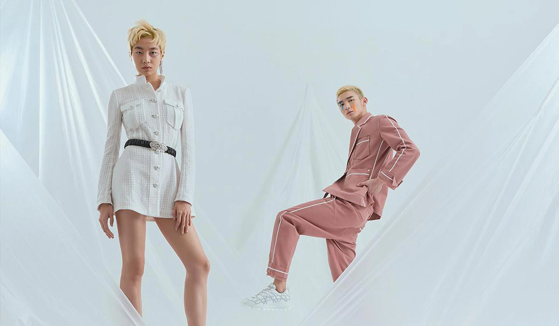 (Left) Polyamide tweed dress, calfskin and crystal belt, and crystal earring, from Chanel. (Right) Cotton jacket, cotton trousers, and technical mesh and rubber sneakers, from Dior.