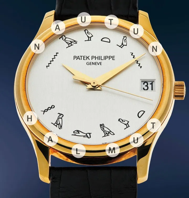 On the dial of the Patek Philippe Calatrava Ref. 3998J-013 in 18k yellow gold, black Egyptian hieroglyphs in place of hour-markers spell out “HALMUT NAUTUN”, believed to reference photographer Helmut Newton