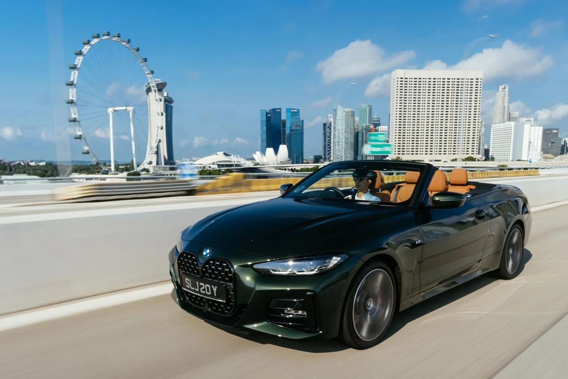 The BMW 4 Series Convertible being driven in Singapore.