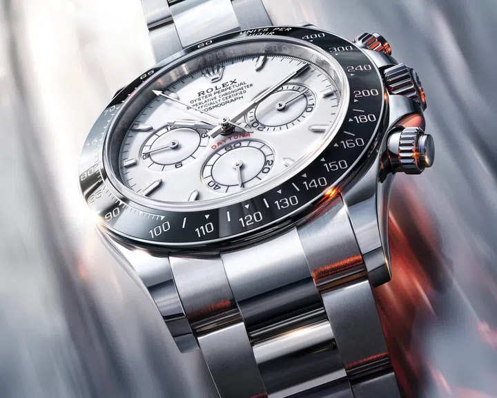 Rolex Oyster Perpetual Cosmograph Daytona in Rolesium with white grand feu enamel dial, anthracite Cerachrom bezel and Oyster bracelet.