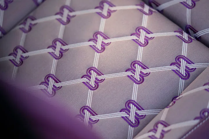 Also making its debut on the Cullinan Series II are the new Duality Twill seats that clients have the option to commission. Made from bamboo, the new rayon textile interior is embroidered with the “Duality” graphic, an abstract interpretation of the two interlinked “R” initials of the marque’s founders. A full Duality interior boasts up to 2.2 million stitches and 11 miles of thread. (Photo: Rolls-Royce) 