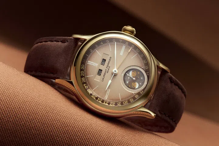 The Laurent Ferrier Classic Moon Dusk – Série Atelier pairs a taupe-to-chocolate gradient dial with a gold-sheen obsidian moon phase display