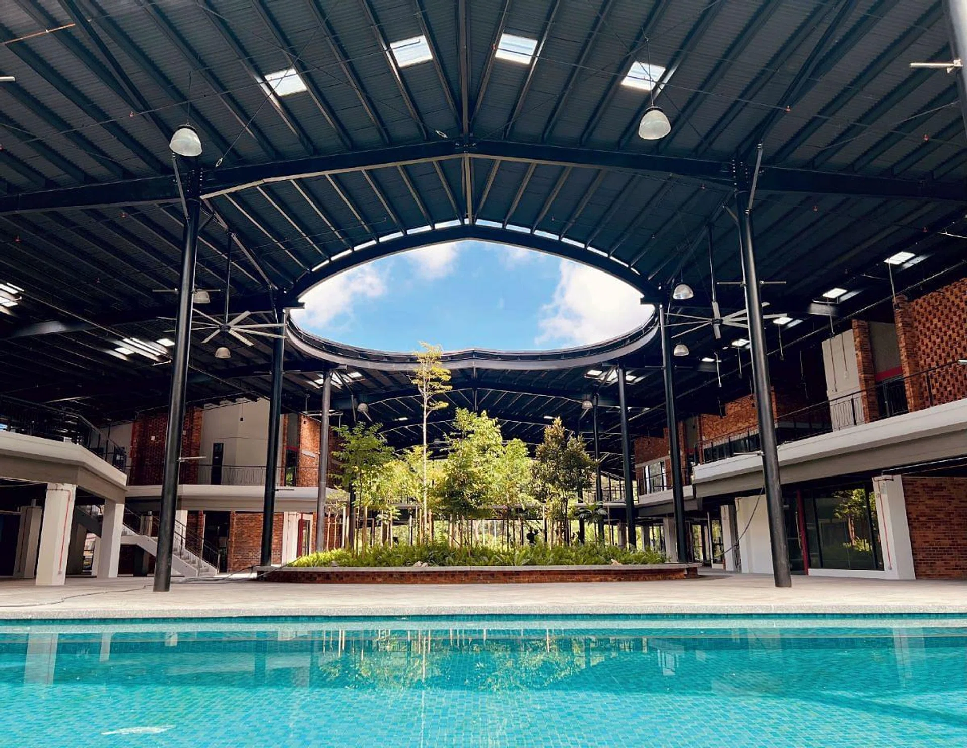 The piazza at the property takes on the shape of Fujian’s traditional Hakka tulou buildings. (Photo: Millennia Village)