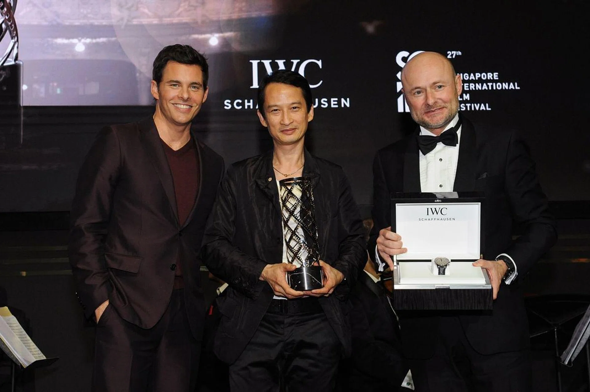 James Marsden, actor and IWC Brand Ambassador, Tran Anh Hung, director and recipient of the IWC Filmmaker Award, and Georges Kern, CEO of IWC Schaffhausen. 