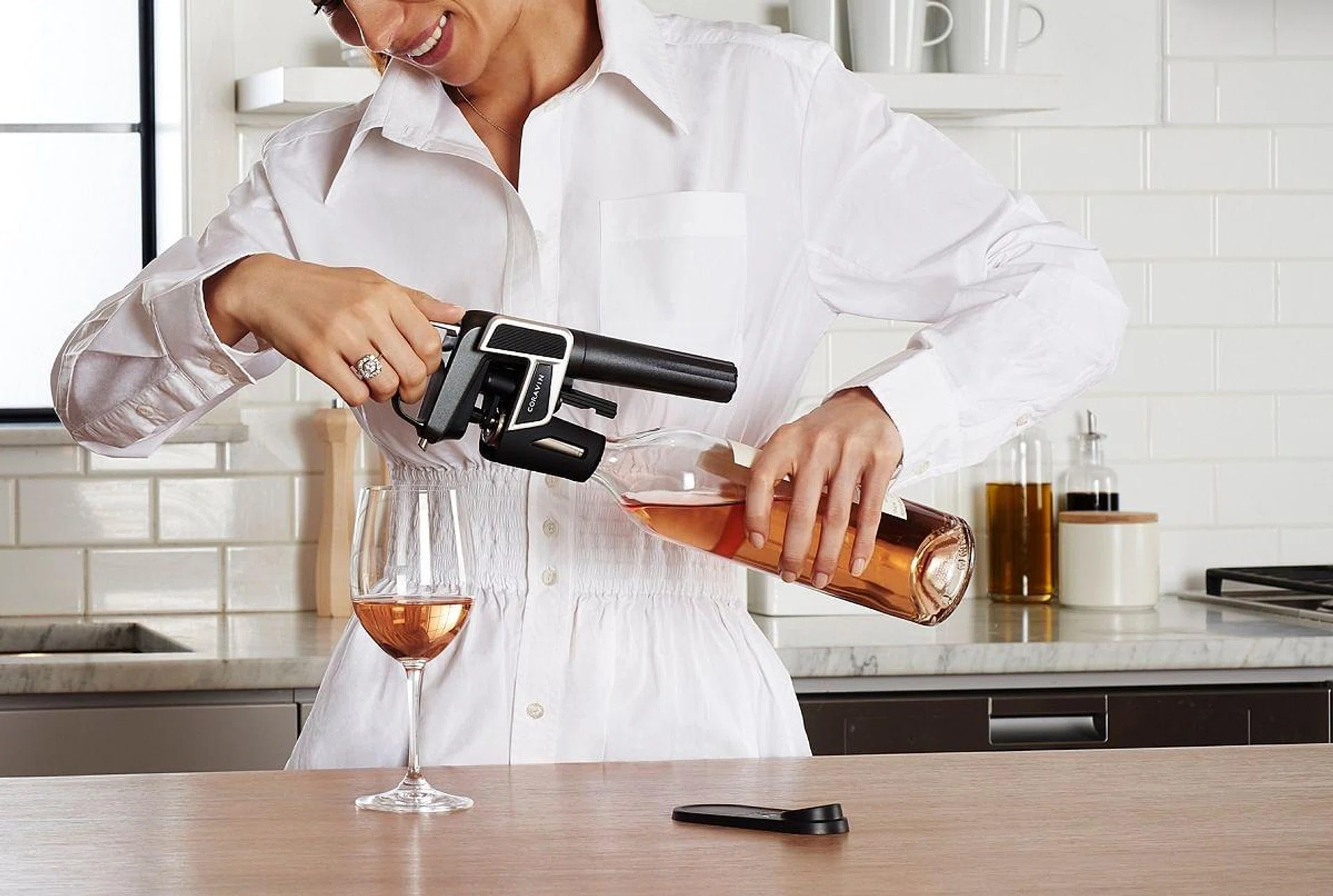 <b>Coravin Wine "Gun"</b><br><br>
This unlikely-looking candidate with an atypical form factor has turned out to be the product with the most glowing reviews. The ingenious device allows for wine consumption by the glass without uncorking or affecting a bottle's contents. It simply pushes a needle through the cork, pumps inert (and hence harmless) argon gas into your bottle, and extricates only the liquid when you thumb the trigger. The cork closes naturally when you withdraw the needle. So no, it won't work with screw-cap wines, but that's not what you bought the gun for, anyway. Currently available from The Oaks, Enoteca Singapore and The Vintage Club.