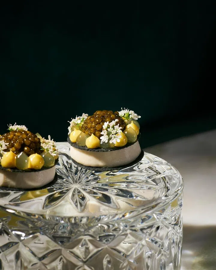 A dish from IGNIV Bangkok’s Spring menu features caviar, an ingredient that one usually wouldn’t think to be produced in Thailand, along with trout and chocolate. (Photo: IGNIV Bangkok)