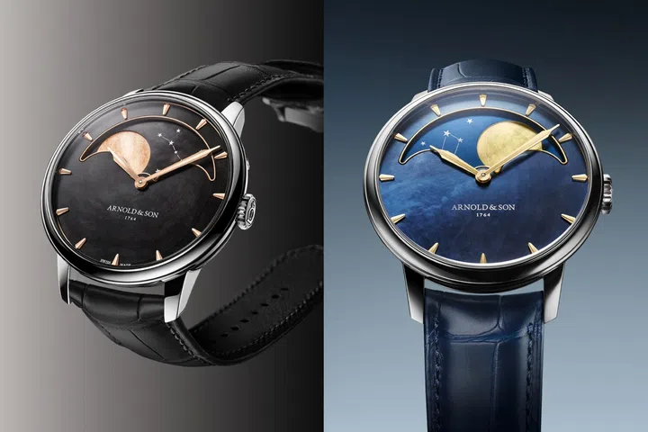 Arnold & Son Perpetual Moon 41.5 Steel “Colours of the Moon” moon phase watch with black dial and a red moon, and the version with blue dial and a golden moon.