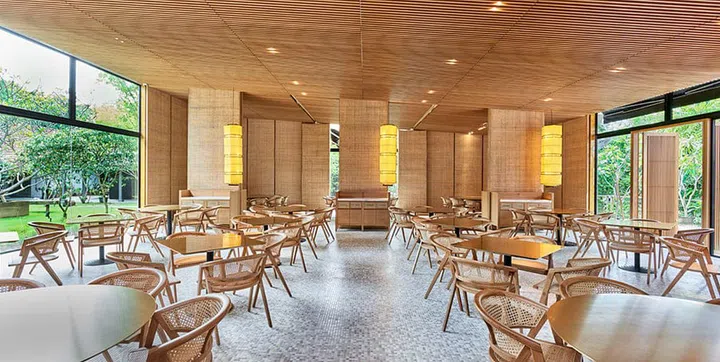 Min Jiang at Dempsey seats 158 diners in a space that incorporates wood and rattan in its timbre trellis ceiling and panelled walls.