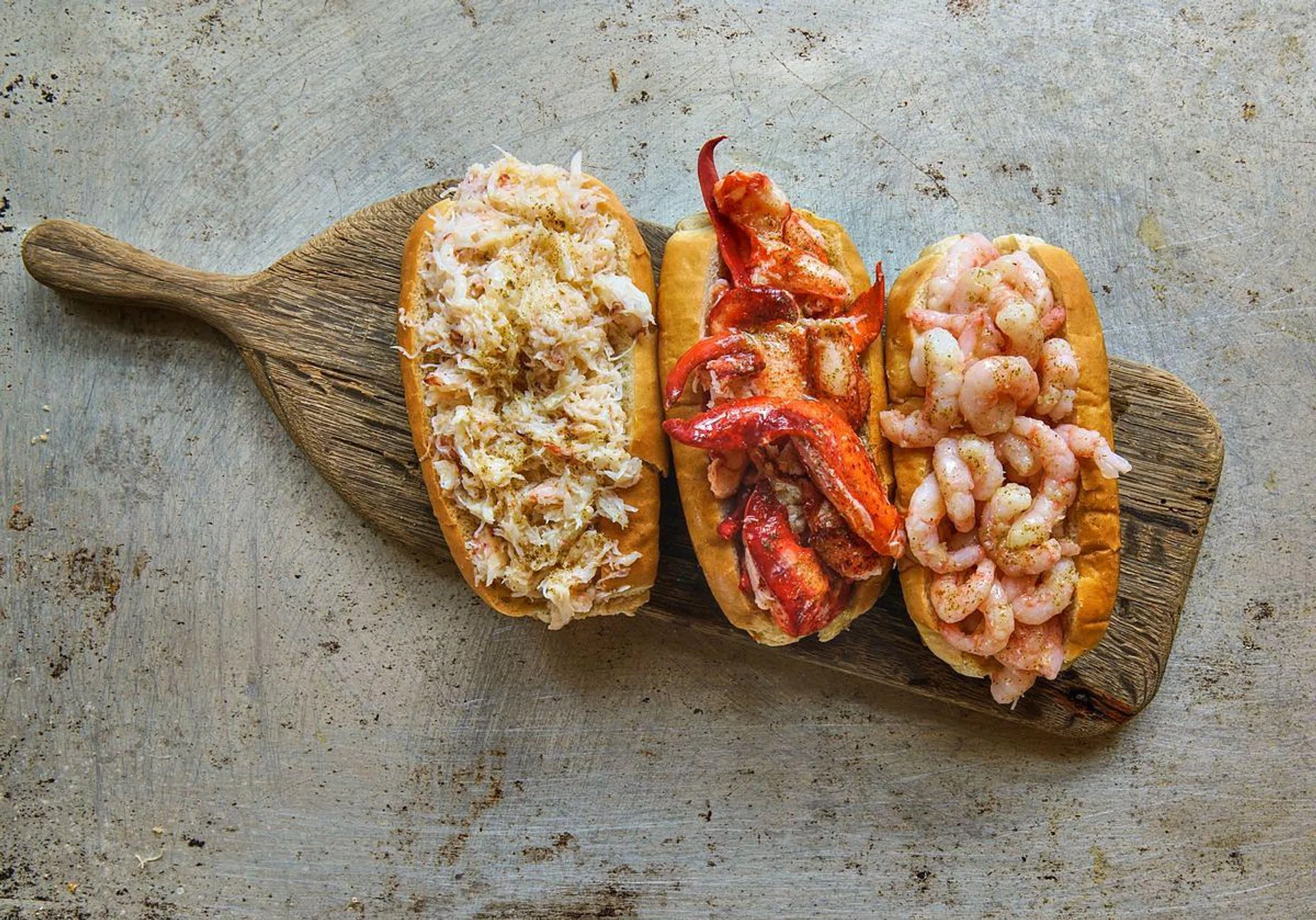 All three classic Luke's Lobster rolls—from left to right; Crab Roll, Lobste Roll and Prawn Roll—are available in Luke's Lobster Singapore 