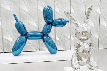 Jeff Koons' Rabbit and Balloon Dog. Photo by Derick McKinney on Unsplash