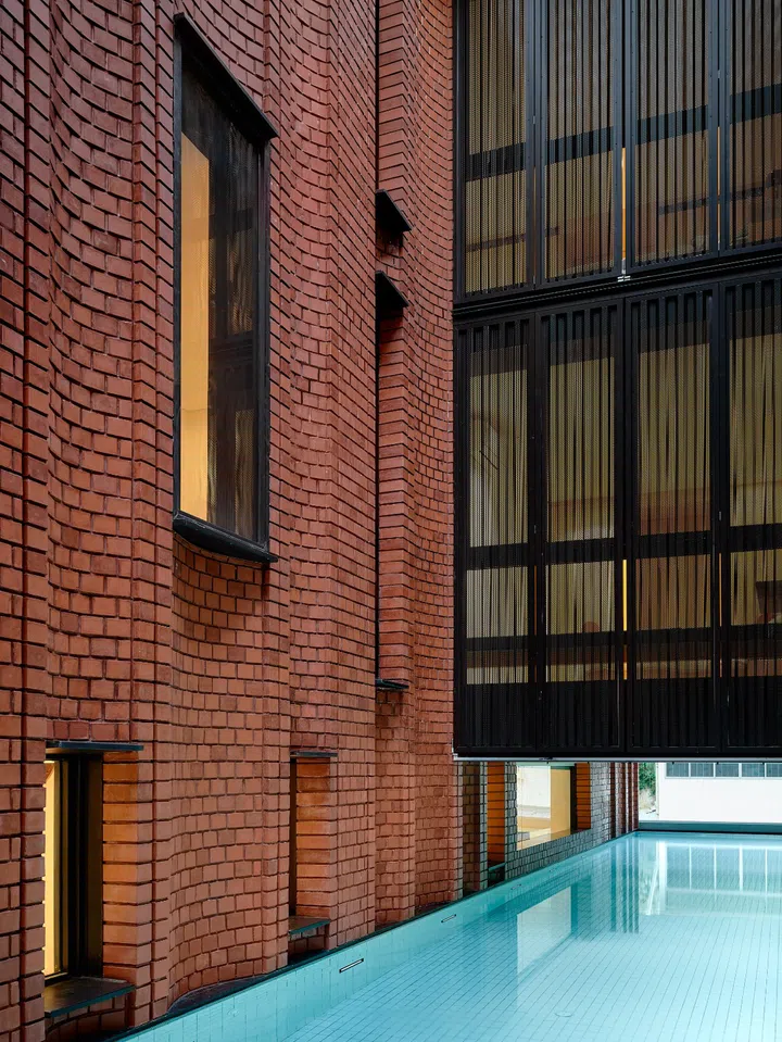 Windows look into the elevated pool, fostering a connection between family members. (Photo: Derek Swalwell)