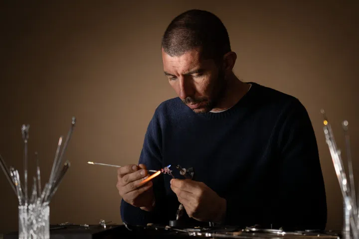Glass artist Simone Crestani, creator of the transparent sculpted octopus for Vacheron Constantin’s Glassoctopus watch.