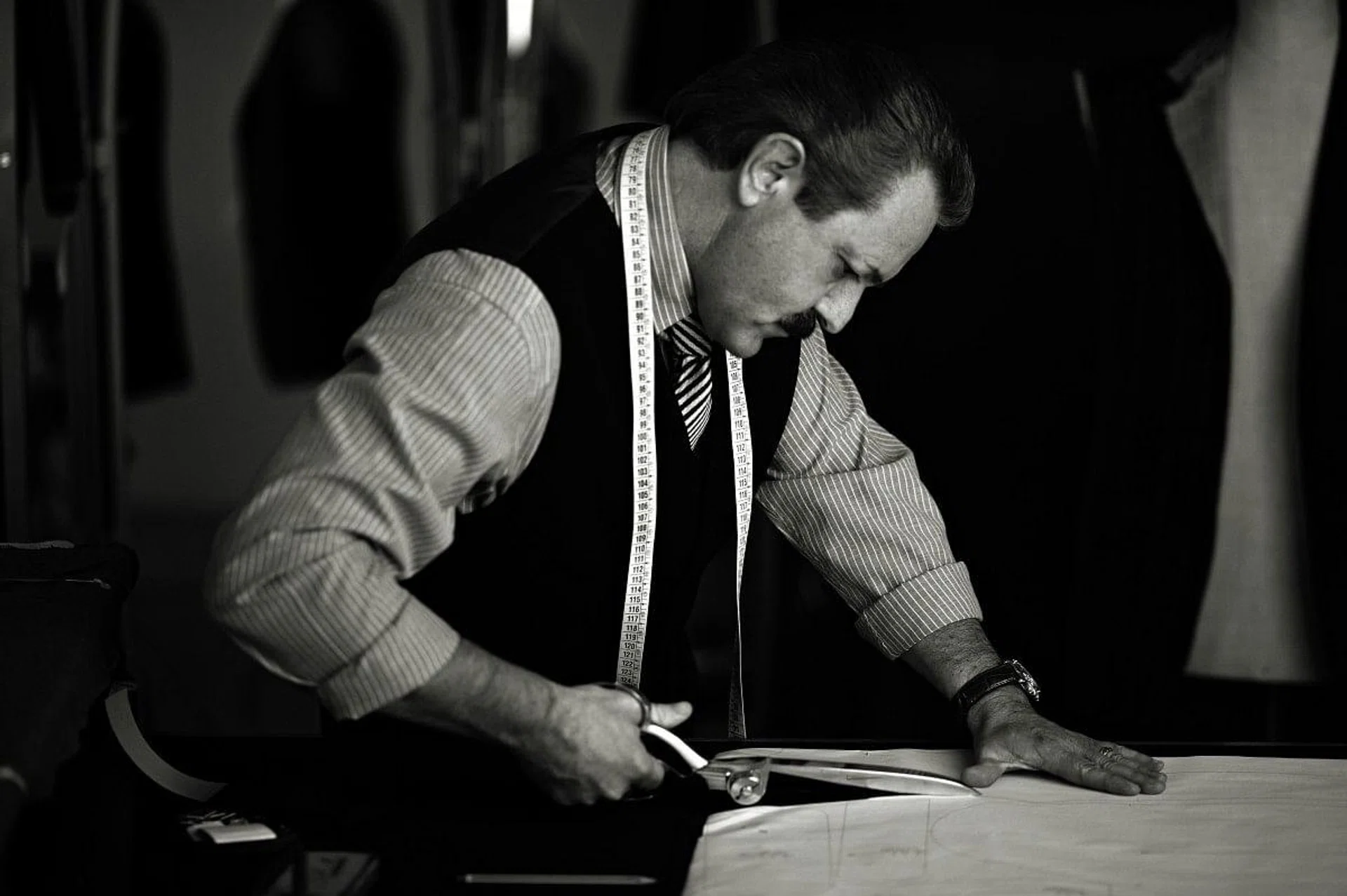 Assembling and finishing -
The garment is placed on a bust to confirm that the drape and form of the jacket are aligned correctly. The internal canvassing – typically made from a mix of linen and horsehair – is now sewn into the chest area. Enhancing a man’s shape, this allows easy movement, yet gives the jacket the snug fit of a second skin. It is also a mark of a suit’s pedigree, as only the finest handmade garments in the world are fully canvassed. Each step of workmanship – from attaching the felt lining for support in the collar to finishing the buttonholes – is then carried out by hand, involving over 200 tailors, each with a specialised role. 