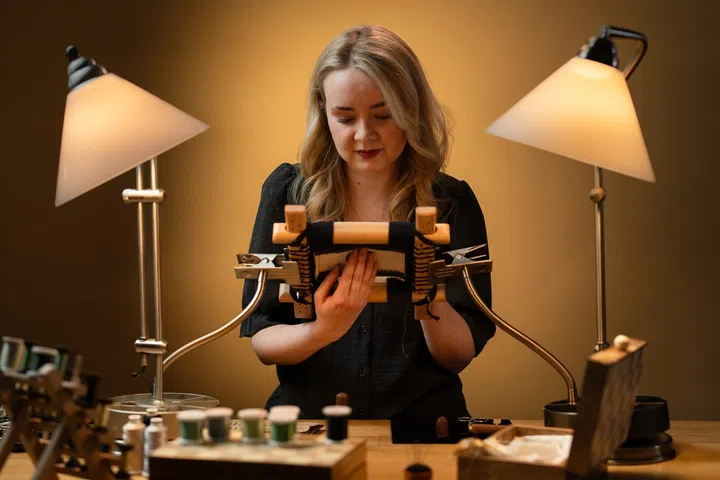 Embroidery artist Laura Baverstock, creator of the miniature gold embroidery tiger for Vacheron Constantin’s Tigerbroidery watch.