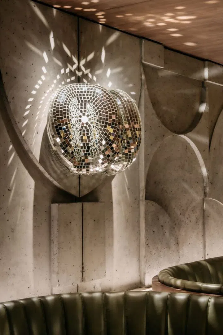 Melting disco balls by Dutch art collective Rotganzen on the walls. (Photo: Chantal Arnts)