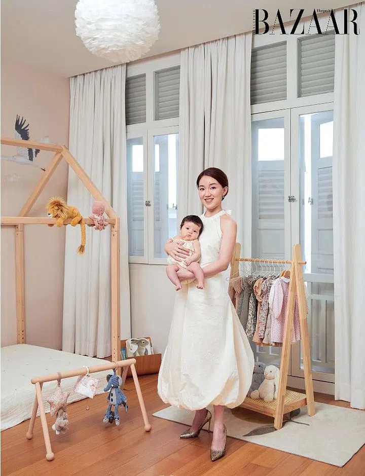 Shen, in her own Renaissance Renaissance dress and Jimmy Choo pumps, with her daughter Olivia.