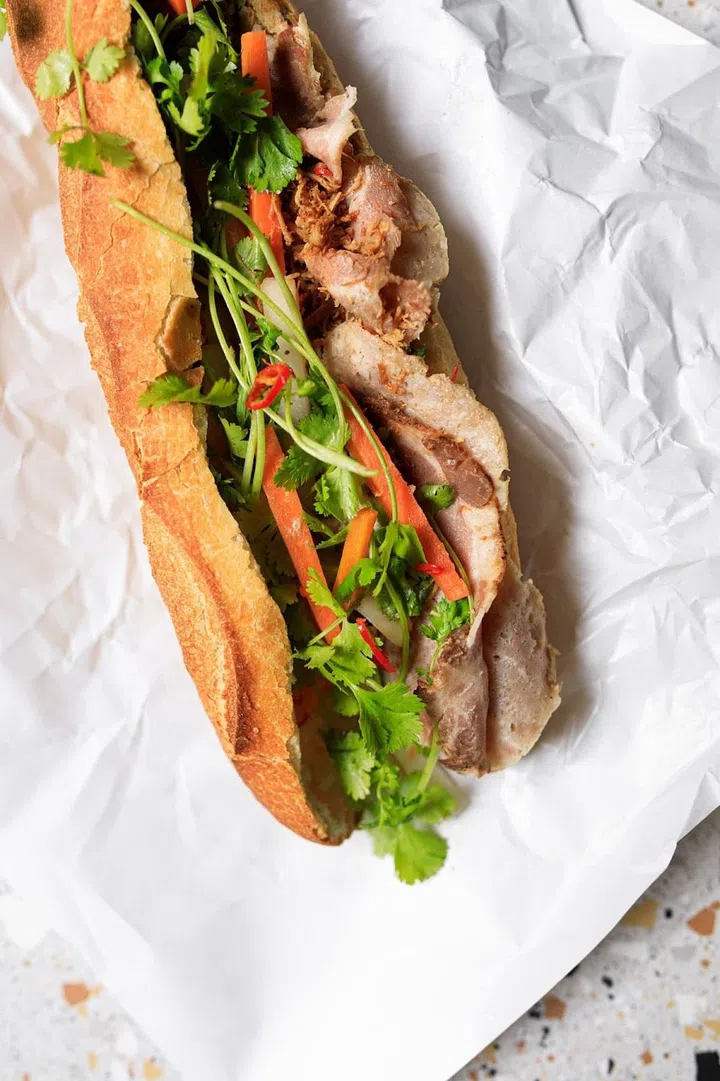 Nonette’s Bánh Mì Đac biet. Inside the baguette is pork liver pate and thin slices of Vietnamese cold-cuts. (Image: Social Food)