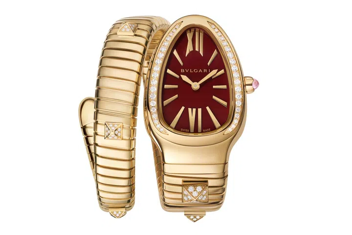 Bvlgari Serpenti Tubogas Studs Capsule in yellow gold featuring a red carnelian dial, diamond-set stud accents, and the maison’s signature coiled Tubogas bracelet.
