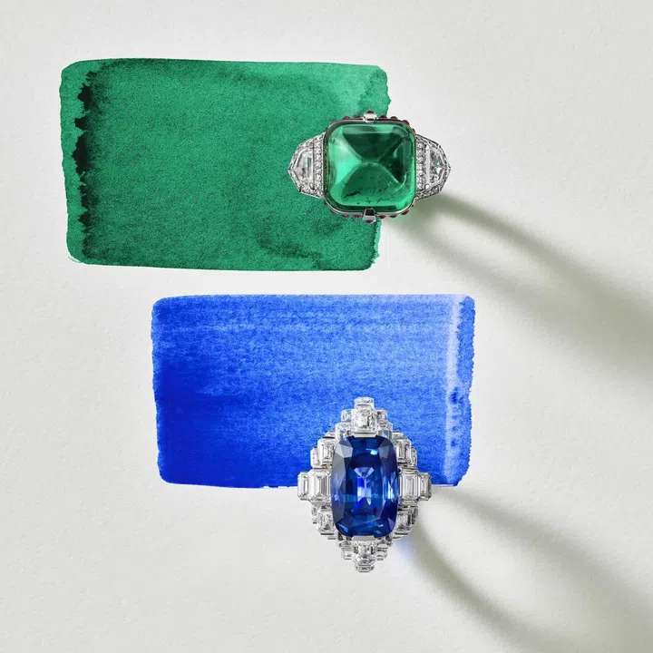 Cartier Le Choeur des Pierres Tetraya and Stratelia rings featuring a Colombian emerald with rubies and diamonds, and a Madagascan sapphire surrounded by diamonds.