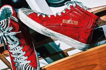 pre-worn red high top sneakers