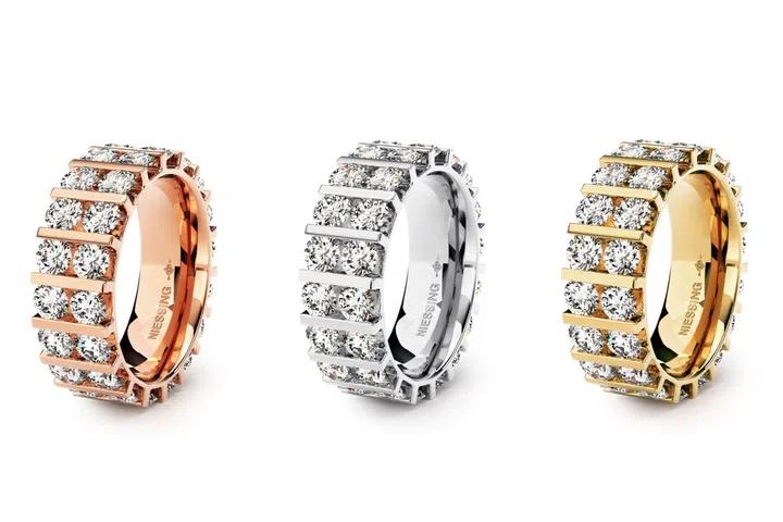 Niessing Memory Highend Duo rings with two rows of floating diamonds set between structured gold bars in a minimalist geometric design.