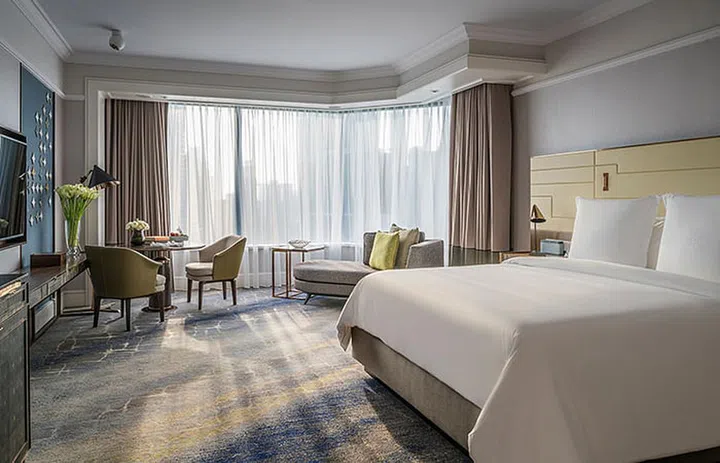 The 624 sq ft Premier Room at Four Seasons Hotel Singapore. 