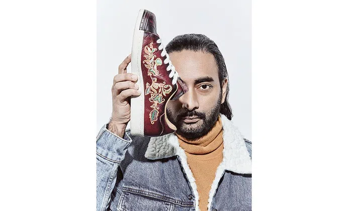 Street ArtChopra is photographed with an in-house collaboration - the Adidas Superstar X Limited Edt.