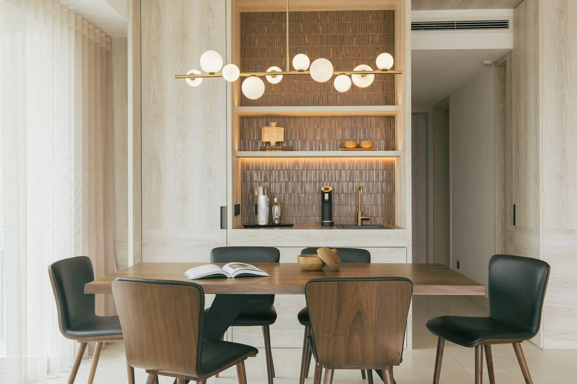 The wife originally wanted an island kitchen, but the apartment layout was such that a pantry would make better use of space. (Photo: Finbarr Fallon, courtesy of Parenthesis Studio)