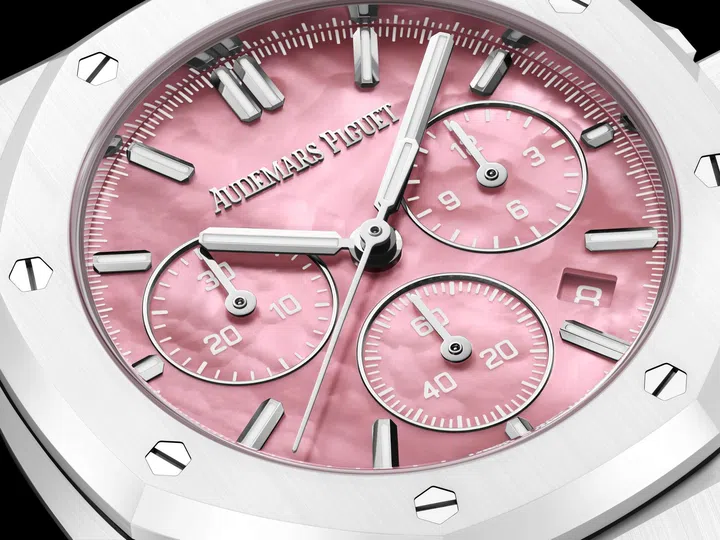 Close-up of the Serena Williams Royal Oak with a pink-tinted mother-of-pearl chronograph dial and white ceramic case.