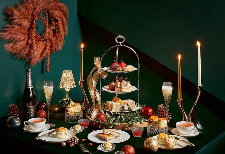 Raffles Hotel’s festive afternoon tea includes a selection of seasonal delicacies, complemented by a glass of champagne, served in the refined setting of the Grand Lobby. PHOTO: RAFFLES HOTEL SINGAPORE