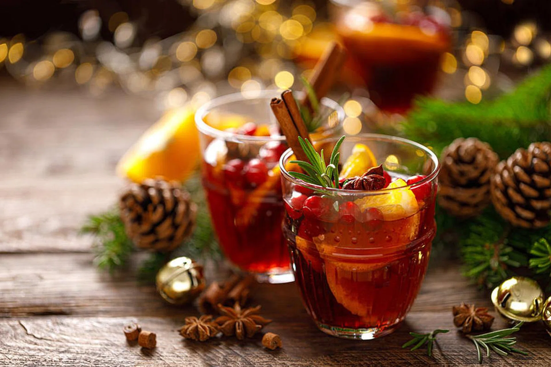 Christmas mulled wine. Traditional festive drink with decorations and fir tree